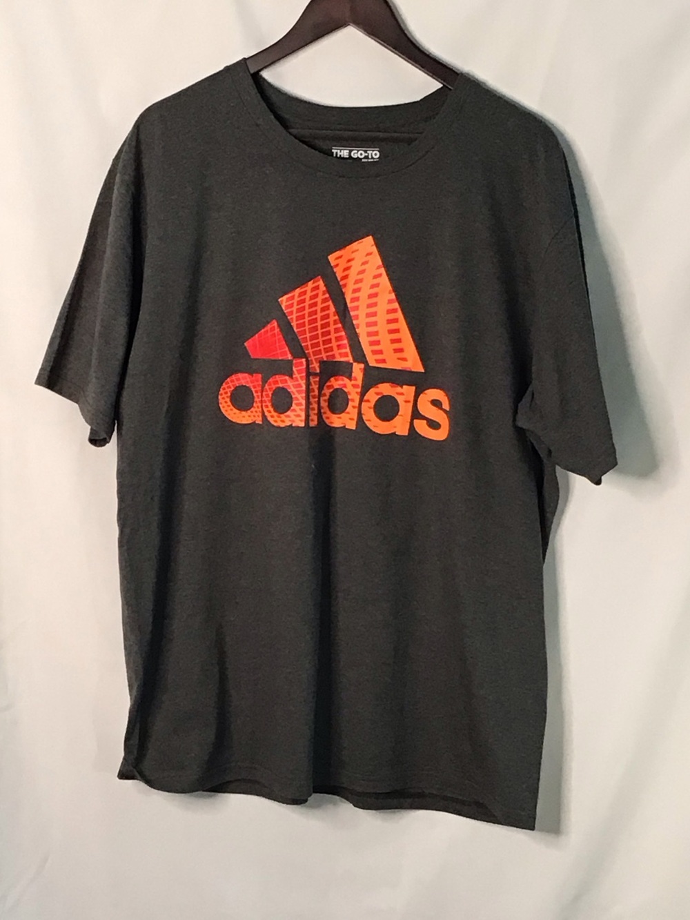 adidas Men’s Dark Gray Short Sleeve Tee with Orange Logo